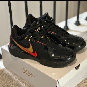 Nike Black Metallic Gold Sneakers